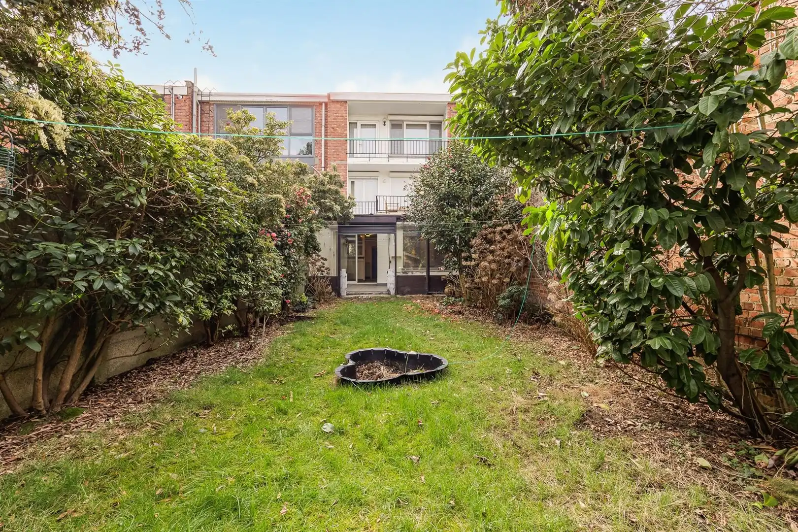 Gelijkvloers appartement met tuin foto 25