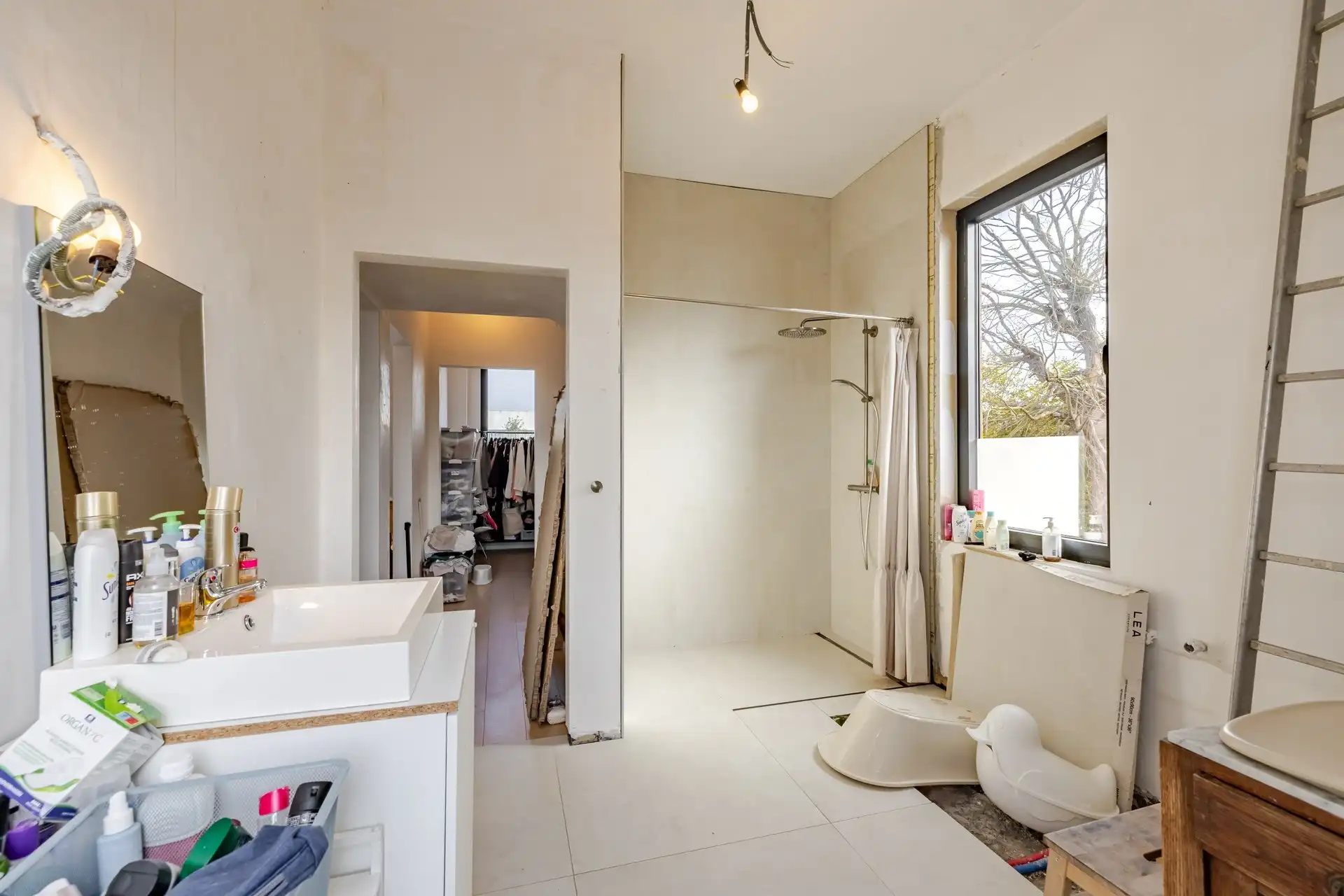 Karaktervol herenhuis met art-decoallure, ruime magazijnen en zuidgerichte tuin  foto 19
