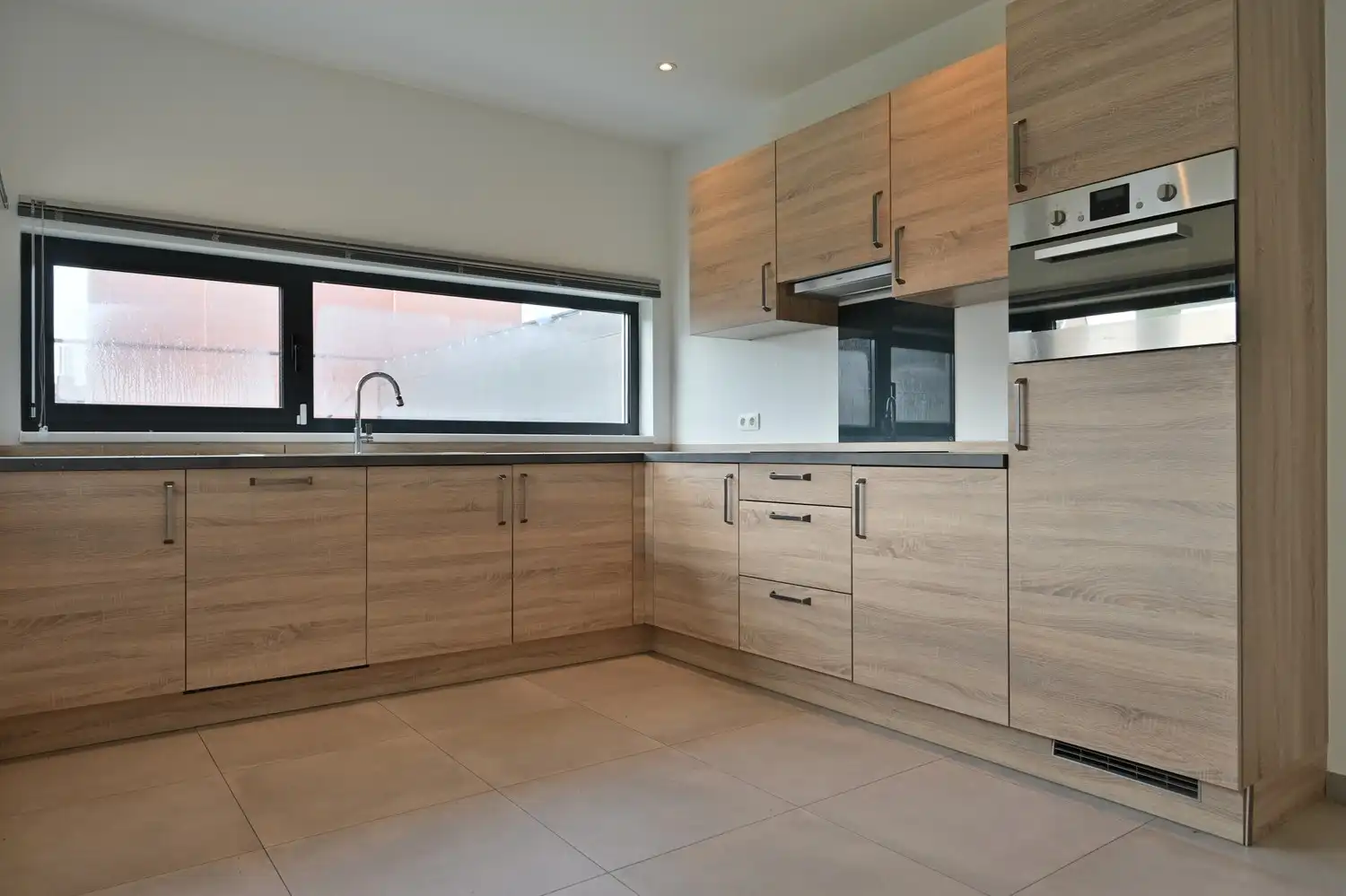 Moderne halfopen woning met 3 slaapkamers in het centrum van Lanaken foto 7