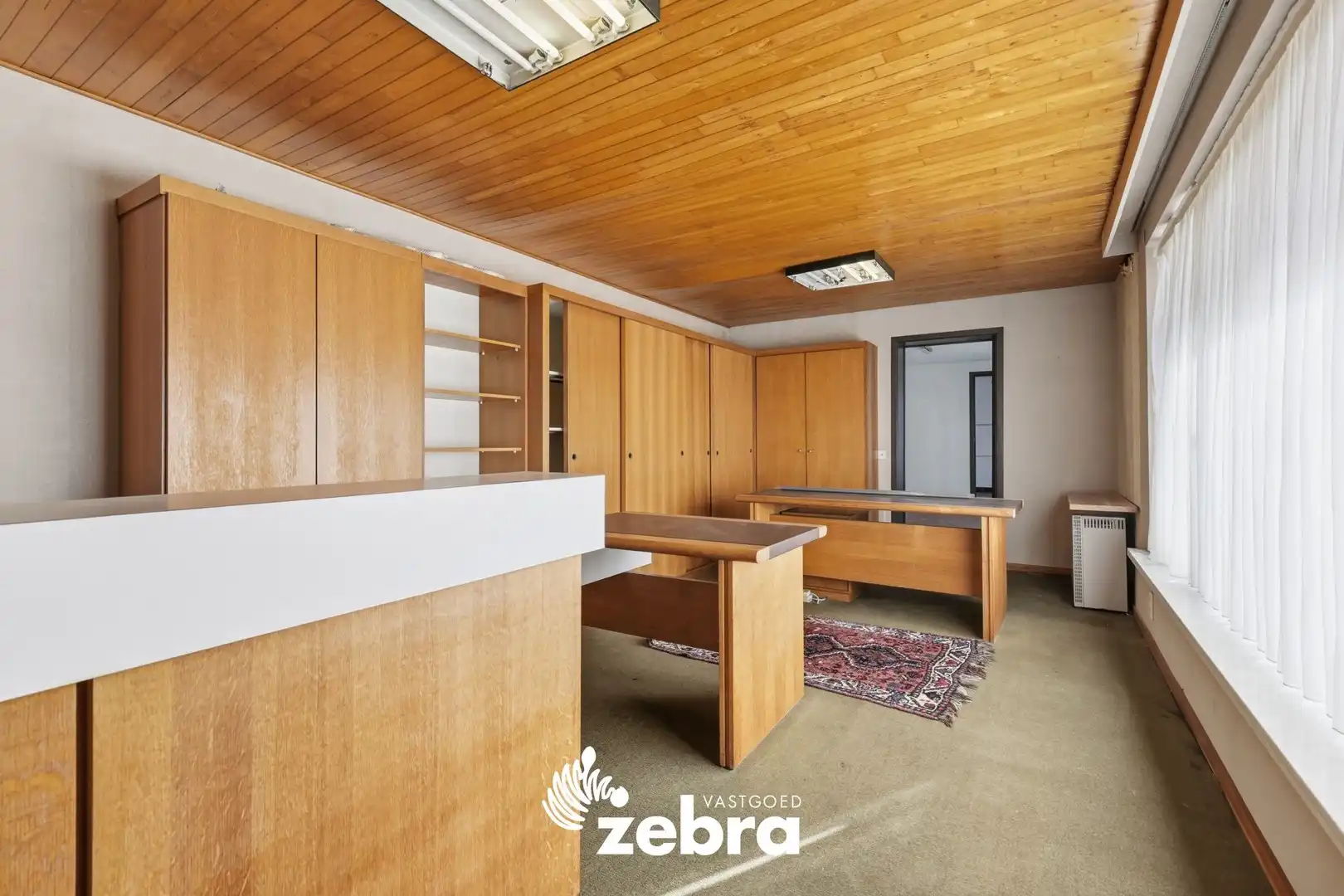 Halfopen bebouwing met praktijk- of kantoorruimte in centrum Tielt foto 23