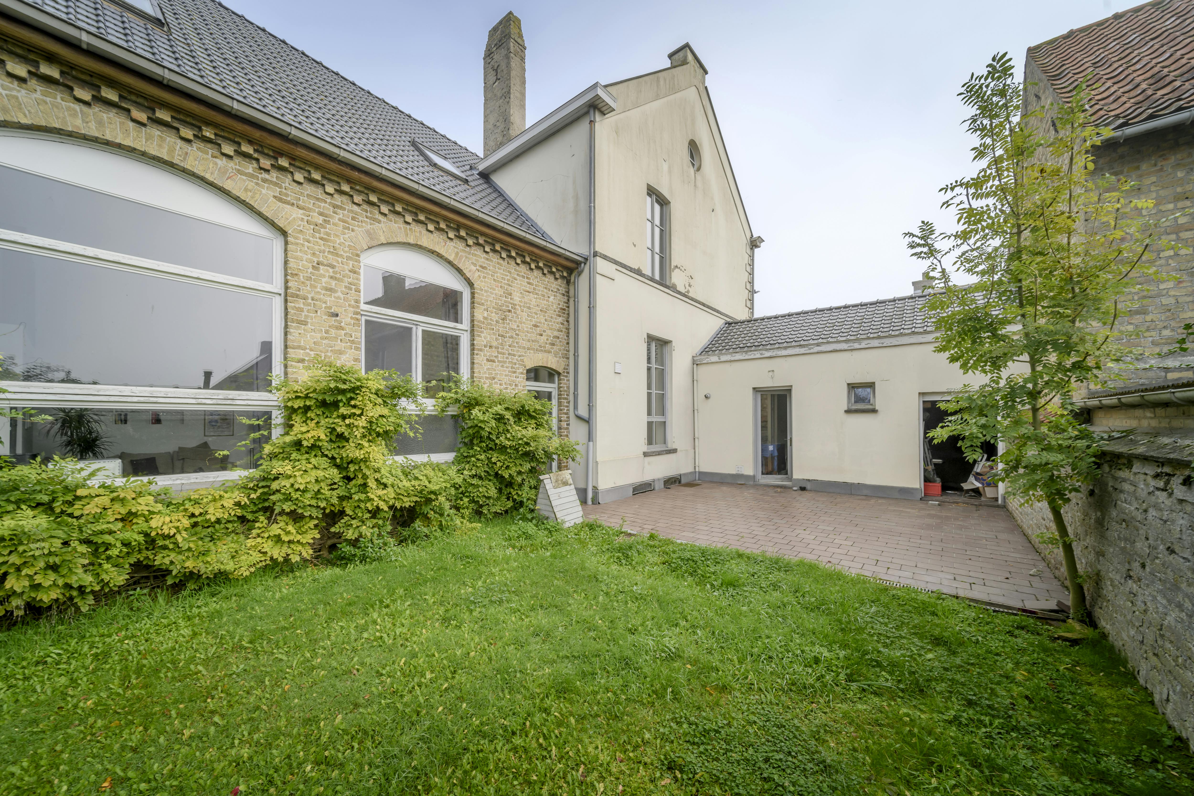 Authentieke herenwoning met 5 slaapkamers, tuin en garage. foto 19