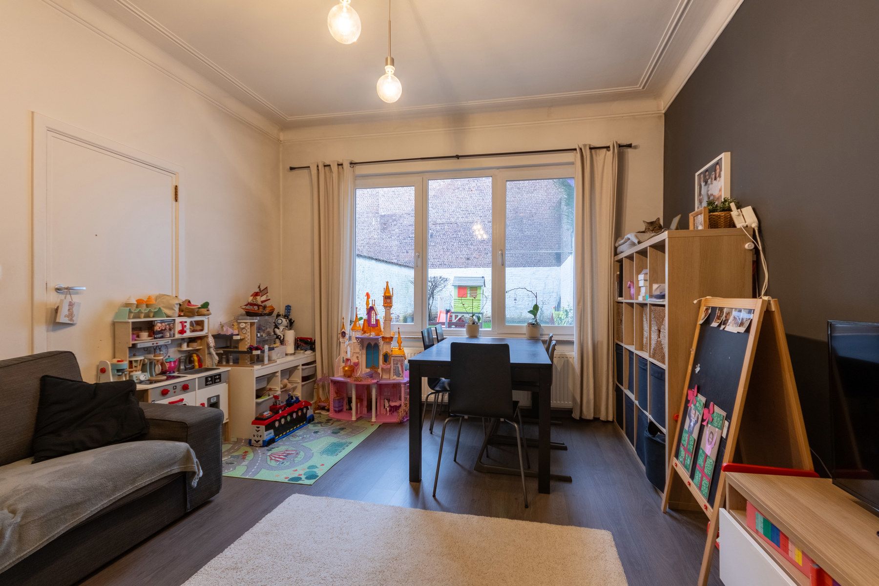Gelijkvloers appartement met terras en tuin foto 7