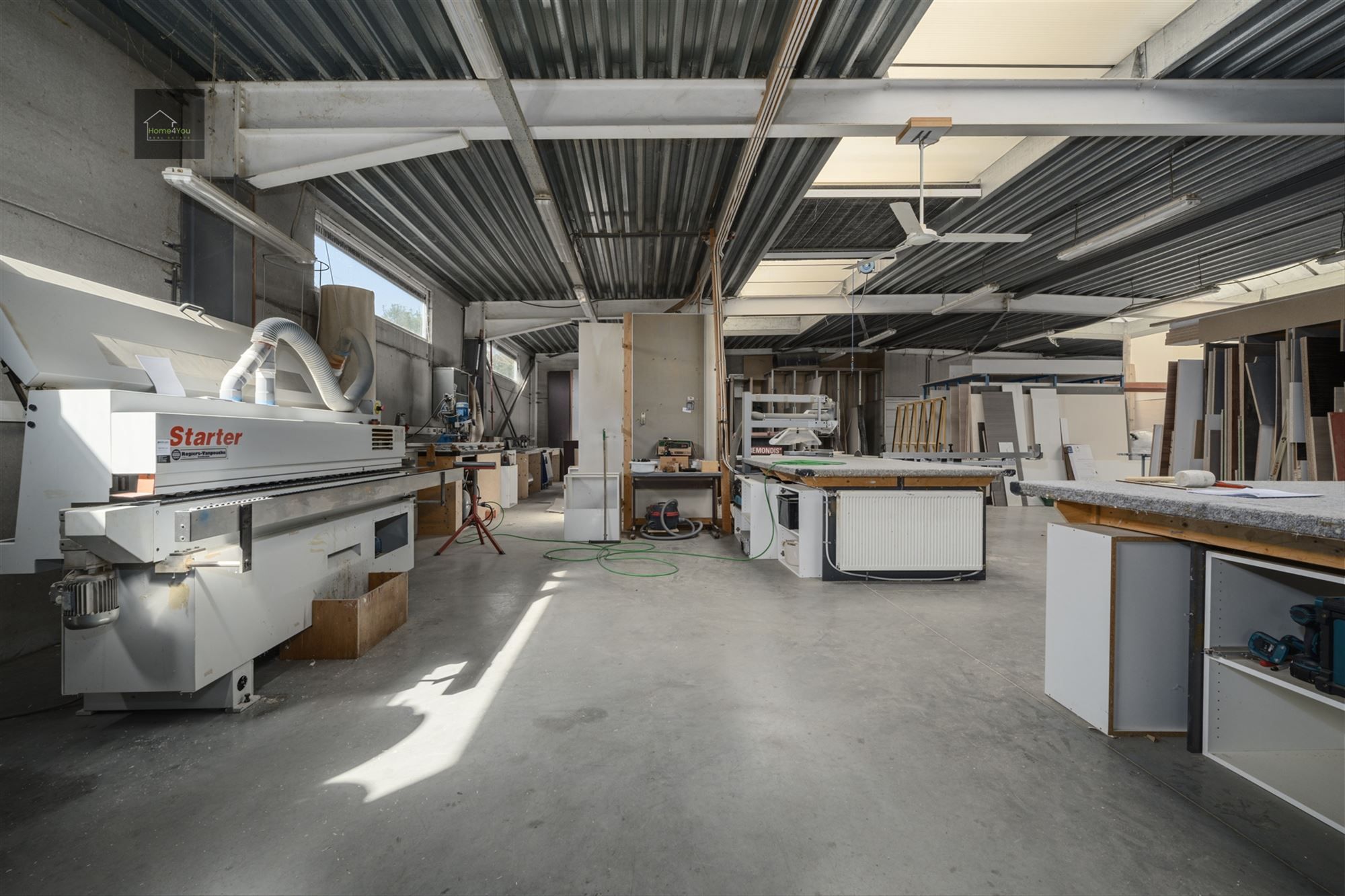  Multifunctioneel bedrijfsgebouw met toonzaal, magazijn, kantoren én woonst op toplocatie. foto 7