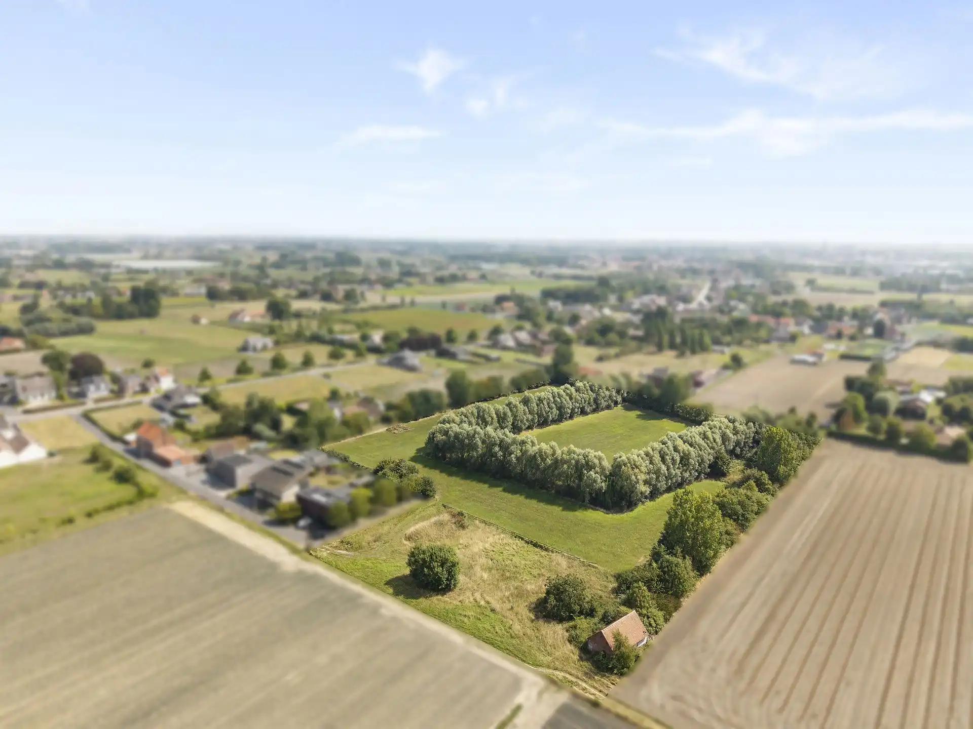 Unieke bouwgrond van 3300m2 + 2 hectare omheinde weide/tuin foto 7