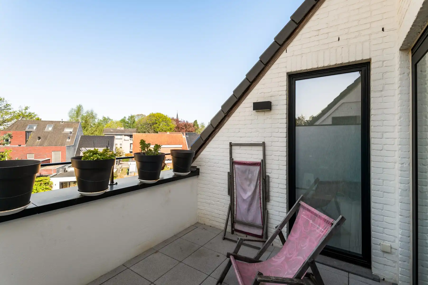 Recent appartement met terras en 2 ondergrondse autostaanplaatsen in het centrum foto 7