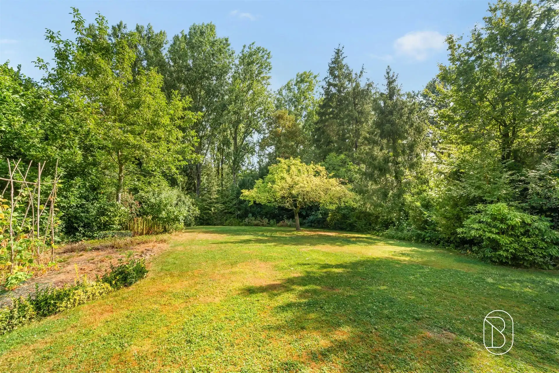 Karaktervolle villa met prachtige tuin op unieke ligging foto 8