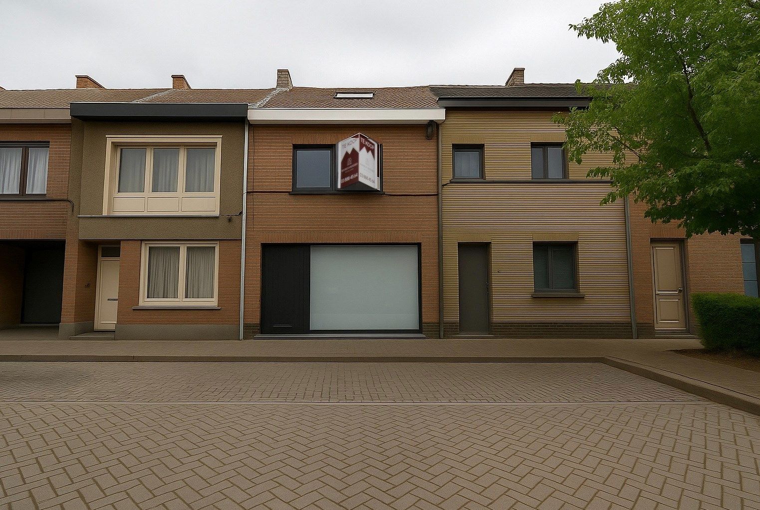 Te koop: Instapklare woning met optie tot drie slaapkamers, zuid gerichte stadstuin én EPC label B in het hart van Sint-Niklaas! foto {{pictureIndex}}
