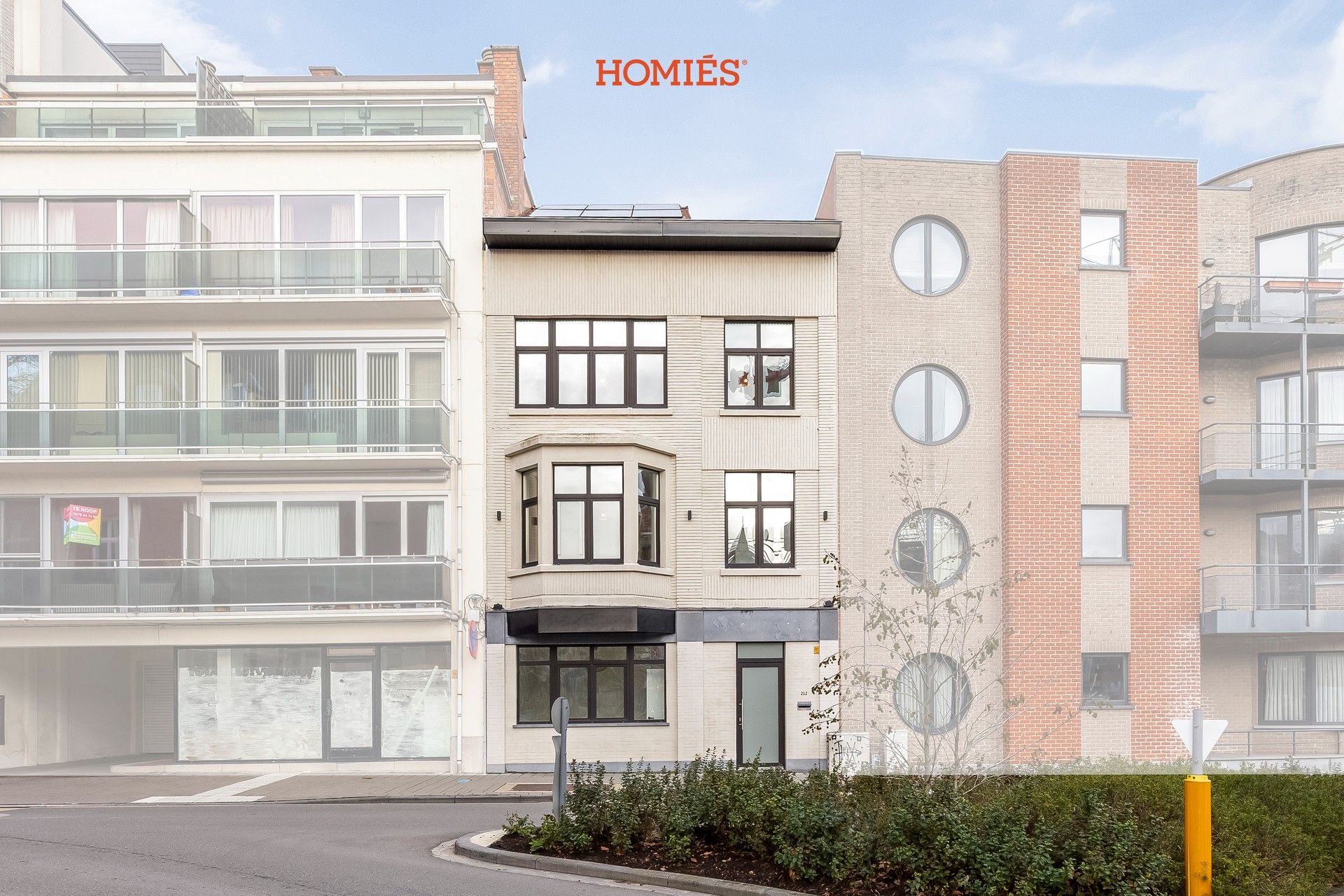 Gerenoveerd herenhuis met 6 slpk, 3 badk in centrum Leuven! foto {{pictureIndex}}