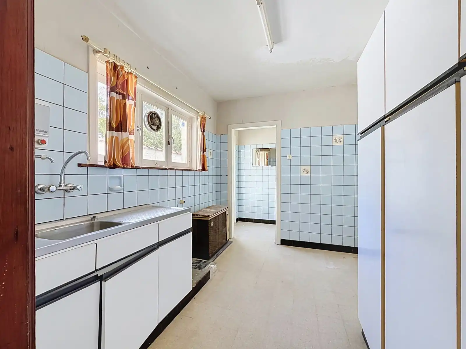 Woning met 4 SLPK, Tuin, Garage én mooi renovatiepotentieel! foto 5