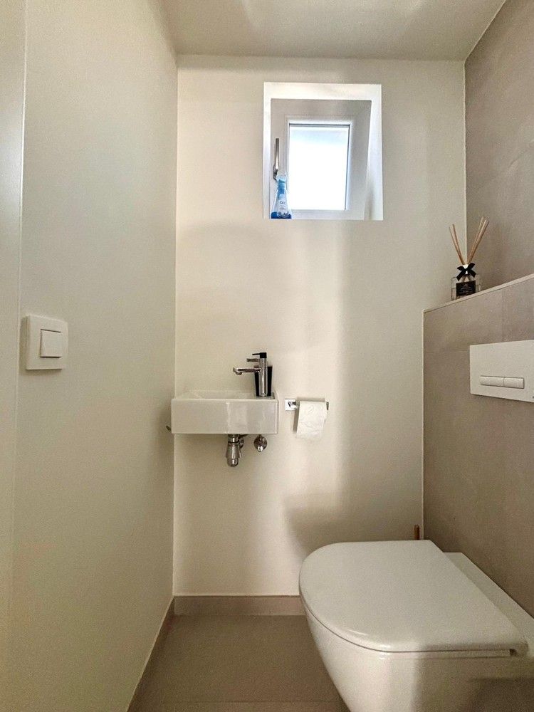 Lichtrijk en modern appartement met twee slaapkamers in het centrum van Wommelgem! foto 18