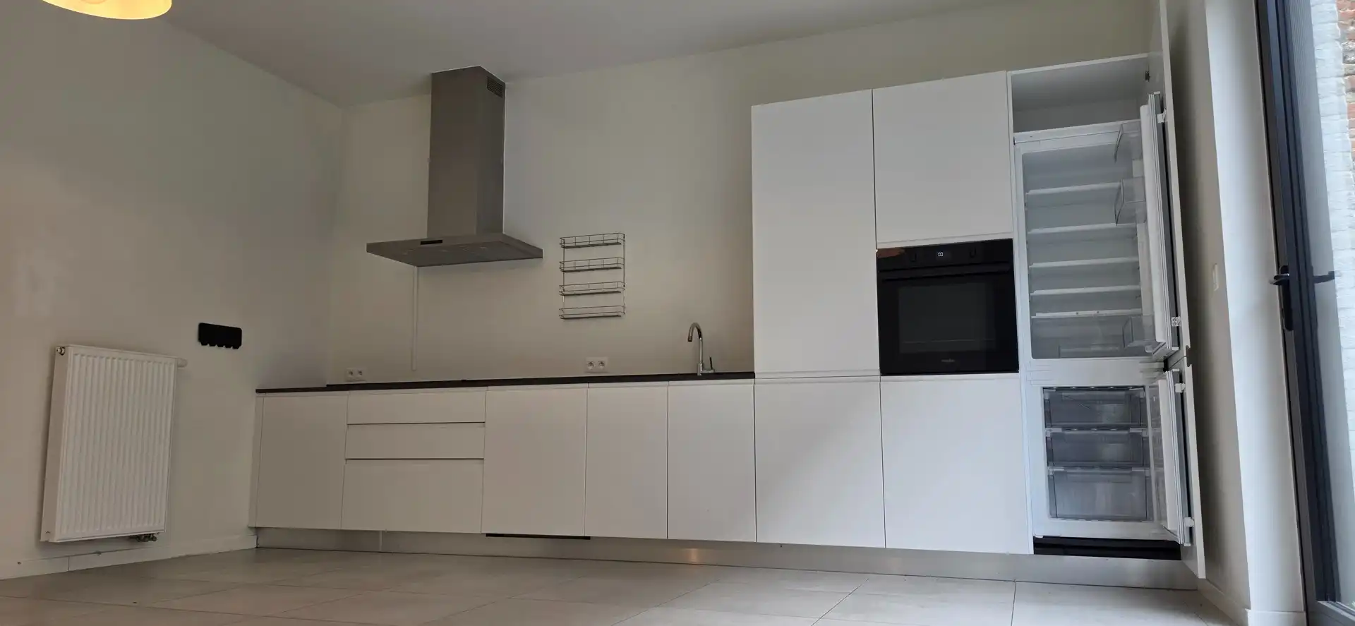 Ruime stadswoning met 3 slaapkamers, privétuin en ondergrondse staanplaats in Antwerpen foto 10