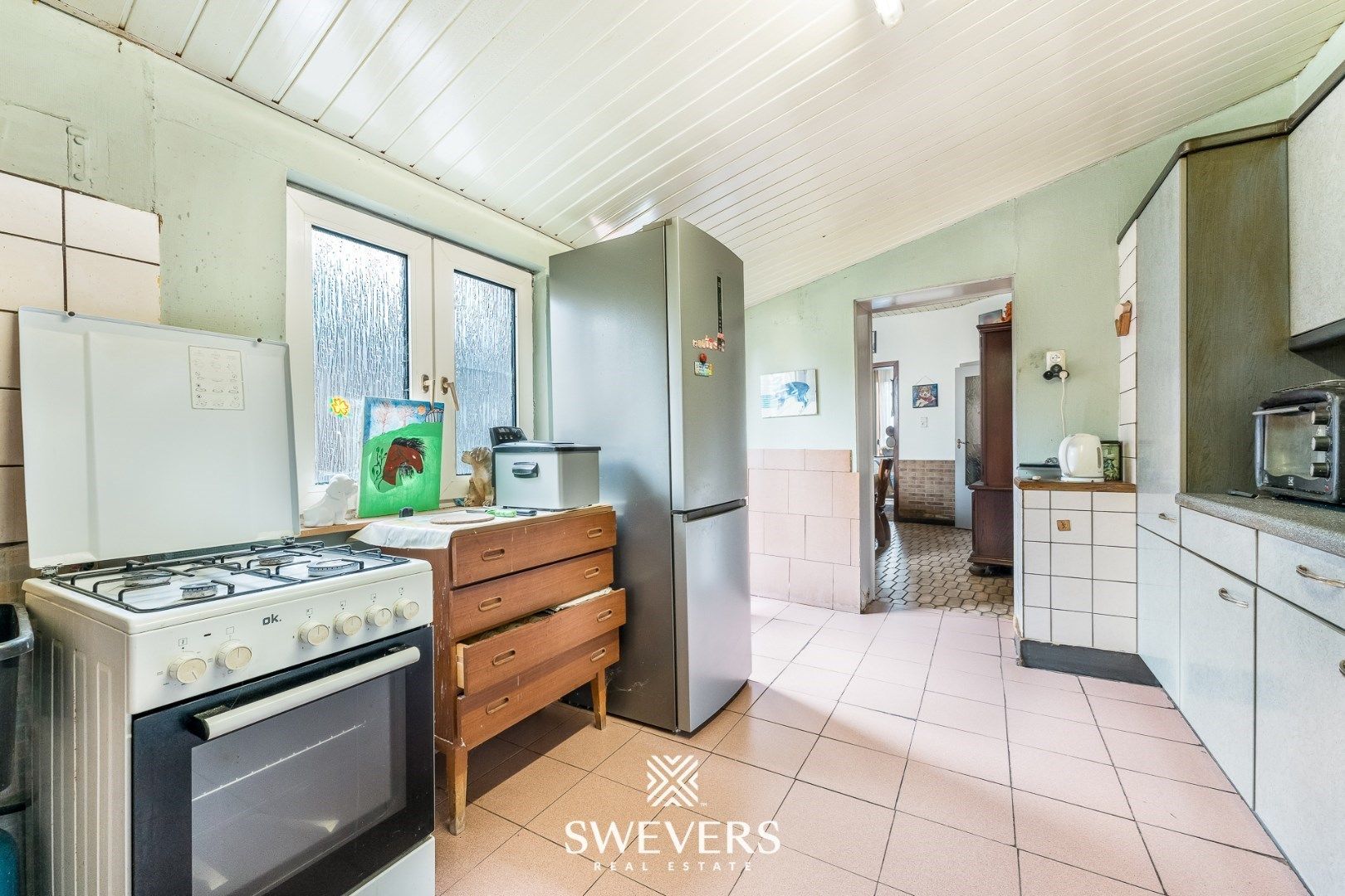 Charmante halfopen woning met renovatiepotentieel in Sint-Truiden foto 13