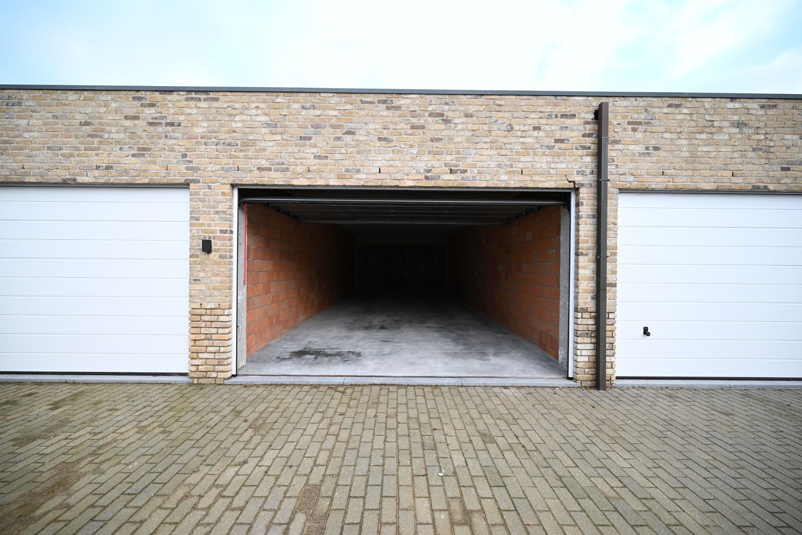 Opslagruimte +/-67m2 (5x13,50m) te koop! foto 2