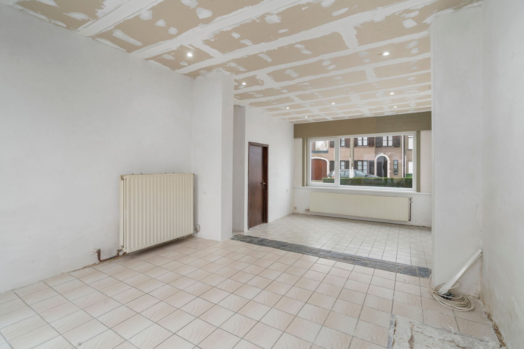 Deels te renoveren woning met 3 slaapkamers en garage foto 3