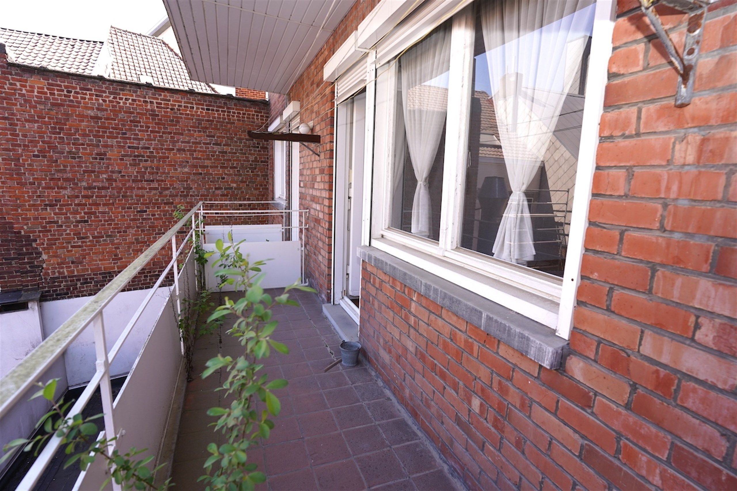 Te moderniseren 3-slpk appartement + garage in hartje centrum! foto 11