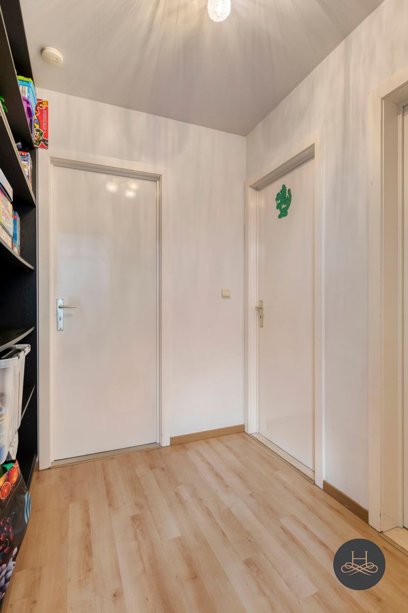 Gezellige halfopen bebouwing met 3 slaapkamers en leuke tuin foto 12