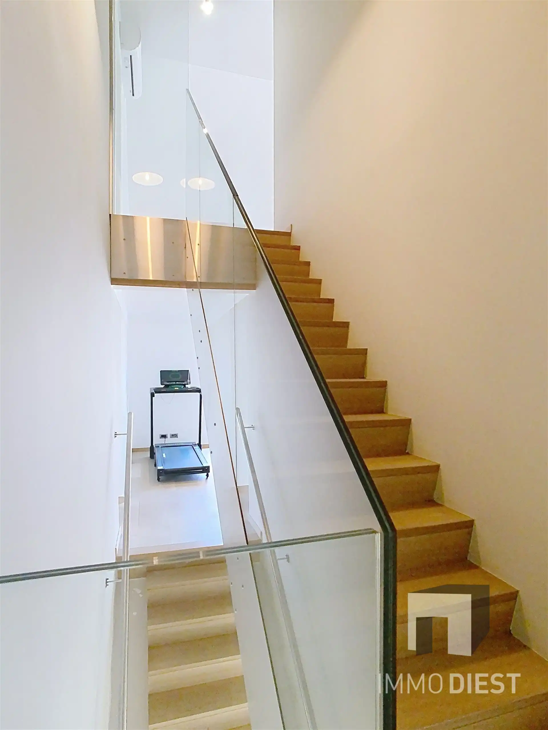 Moderne, lichtrijke woning met aangename tuin aan de voet van hartje Scherpenheuvel. foto 25