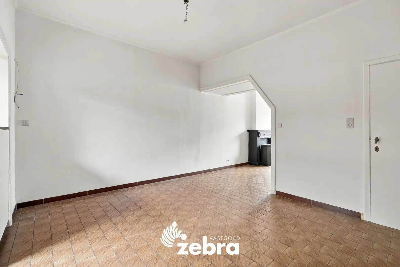 Te renoveren woning met uitweg te Roeselare! foto 5