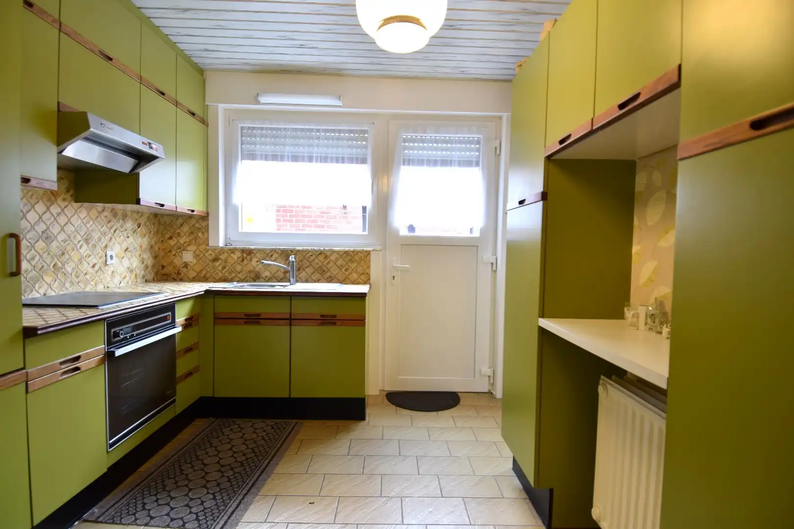 Woning op hoekperceel met 3 slaapkamers, garage en zalige tuin te koop in Gullegem foto 5