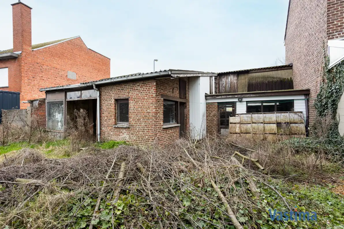 Unieke bouwgrond in het hart van Merchtem foto 14