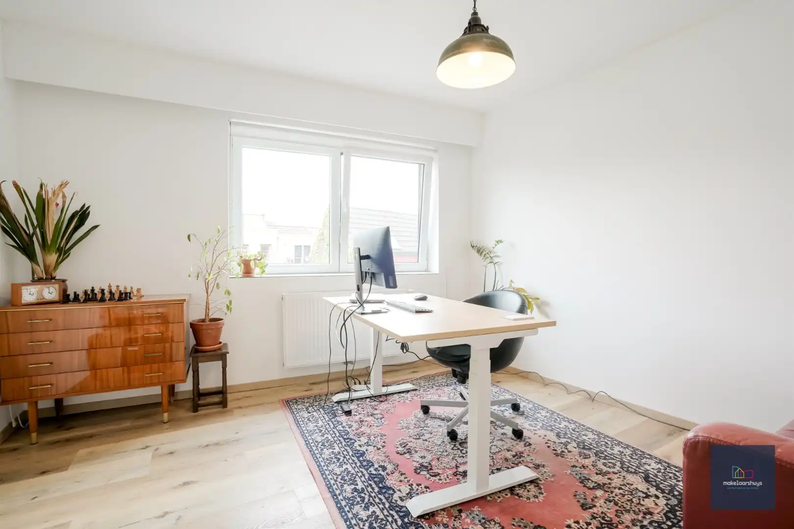 Charmante en instapklare gezinswoning met zonnige tuin foto 12