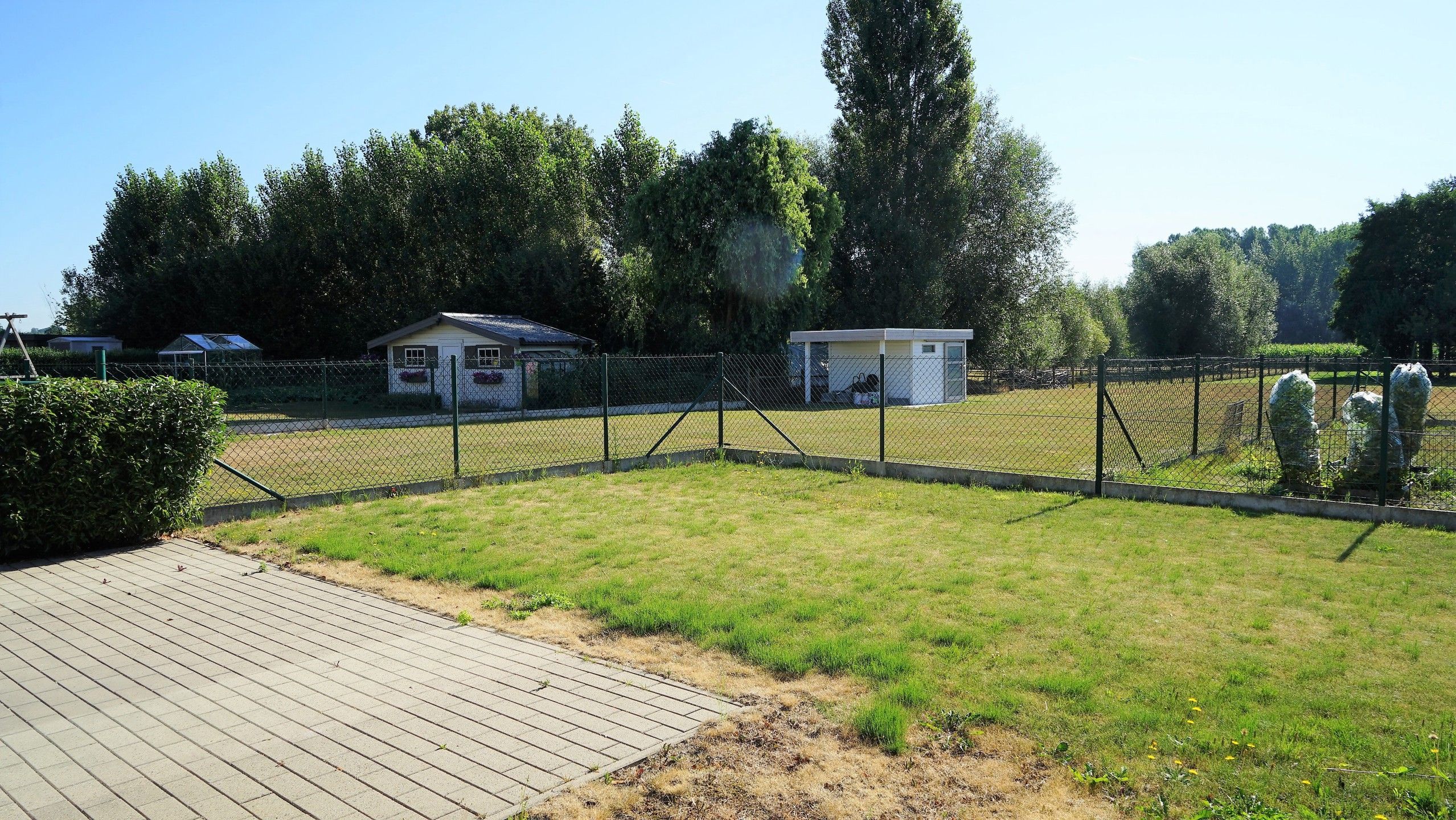 Gelijkvloersappartement met tuin en staanplaats foto 2