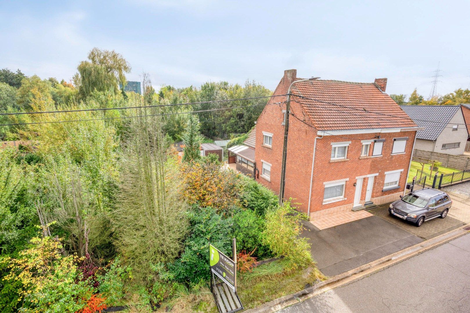 Rustig gelegen te renoveren woning op een mooi perceel van 13 are. foto 35