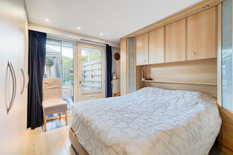 Verzorgd instapklaar twee slaapkamer gelijkvloersappartement met tuin en doorgang langs achteraan foto 14