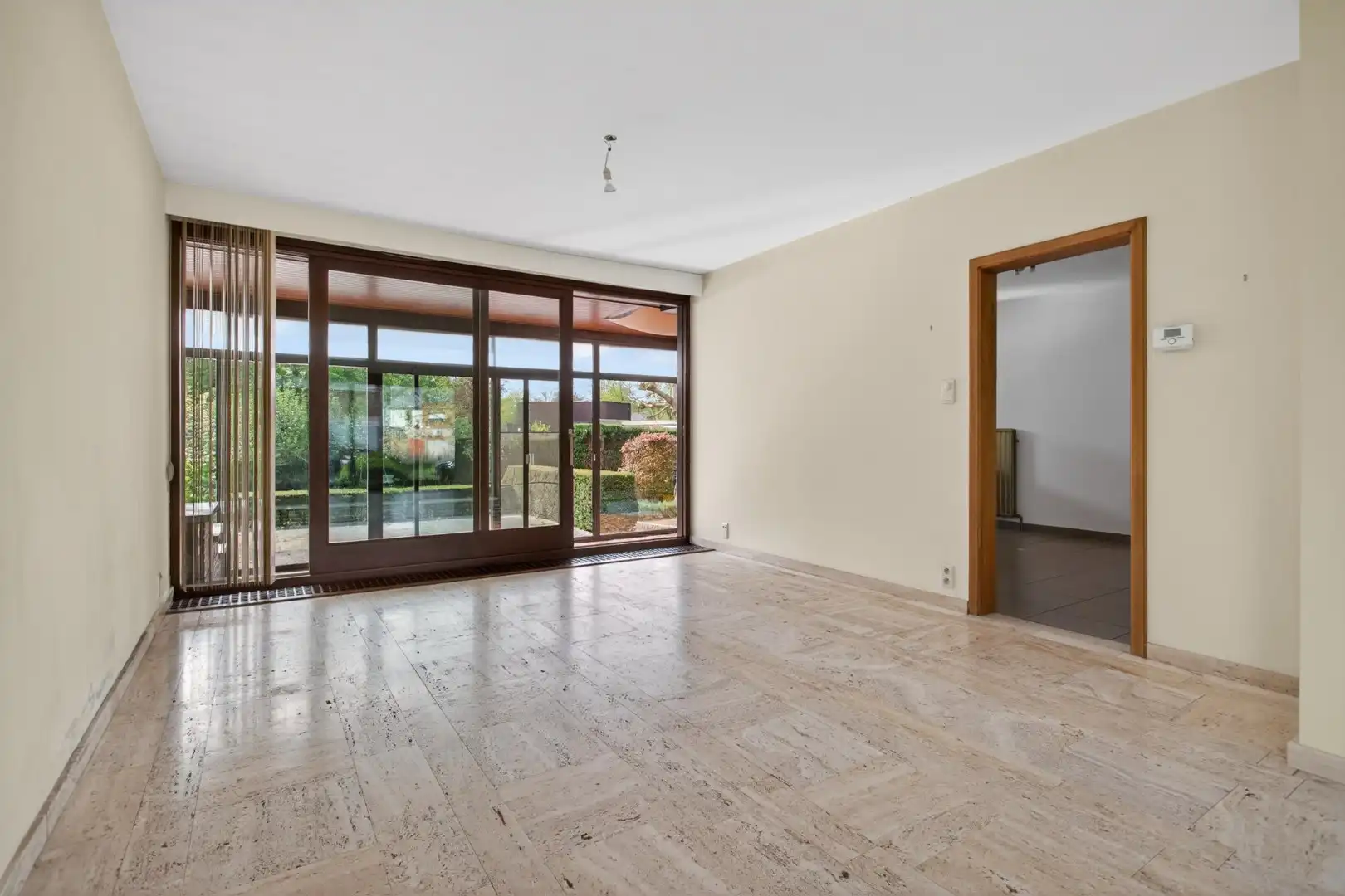 Ruime gelijkvloerse woning met veel potentieel op rustige ligging in Mol foto 16