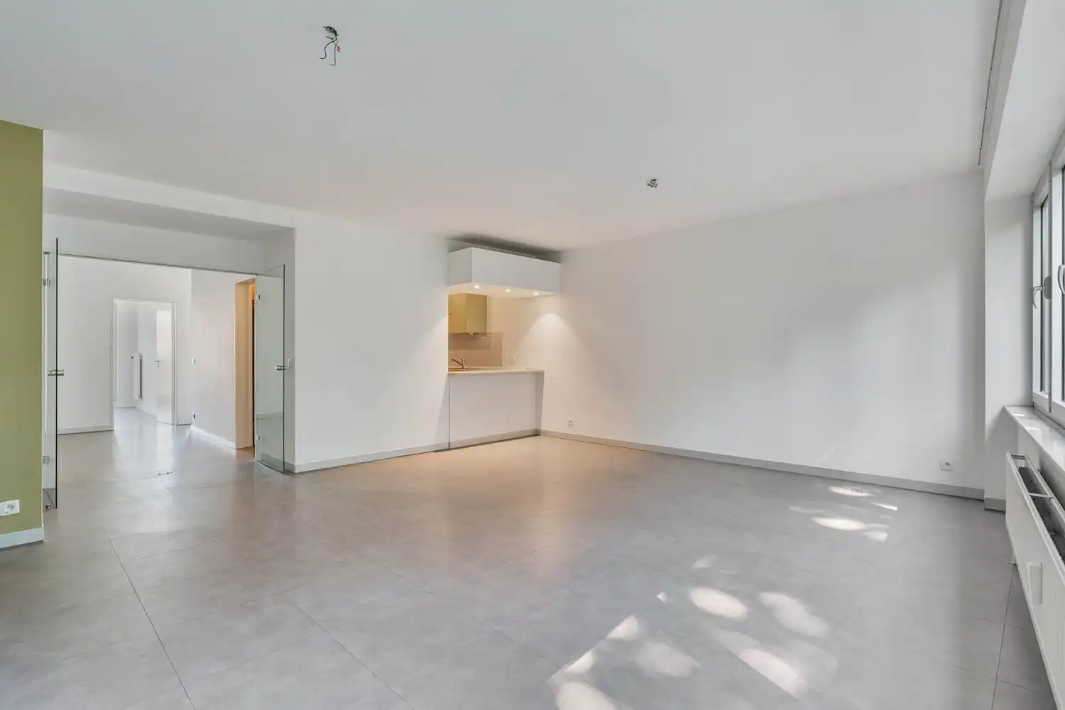 Goed gelegen, lichtrijk en energiezuinig appartement met 2 slaapkamers, een terras en een gemeenschappelijke tuin tegenover de botanische tuin en nabij het UZ Gasthuisberg te centrum Leuven! foto 7