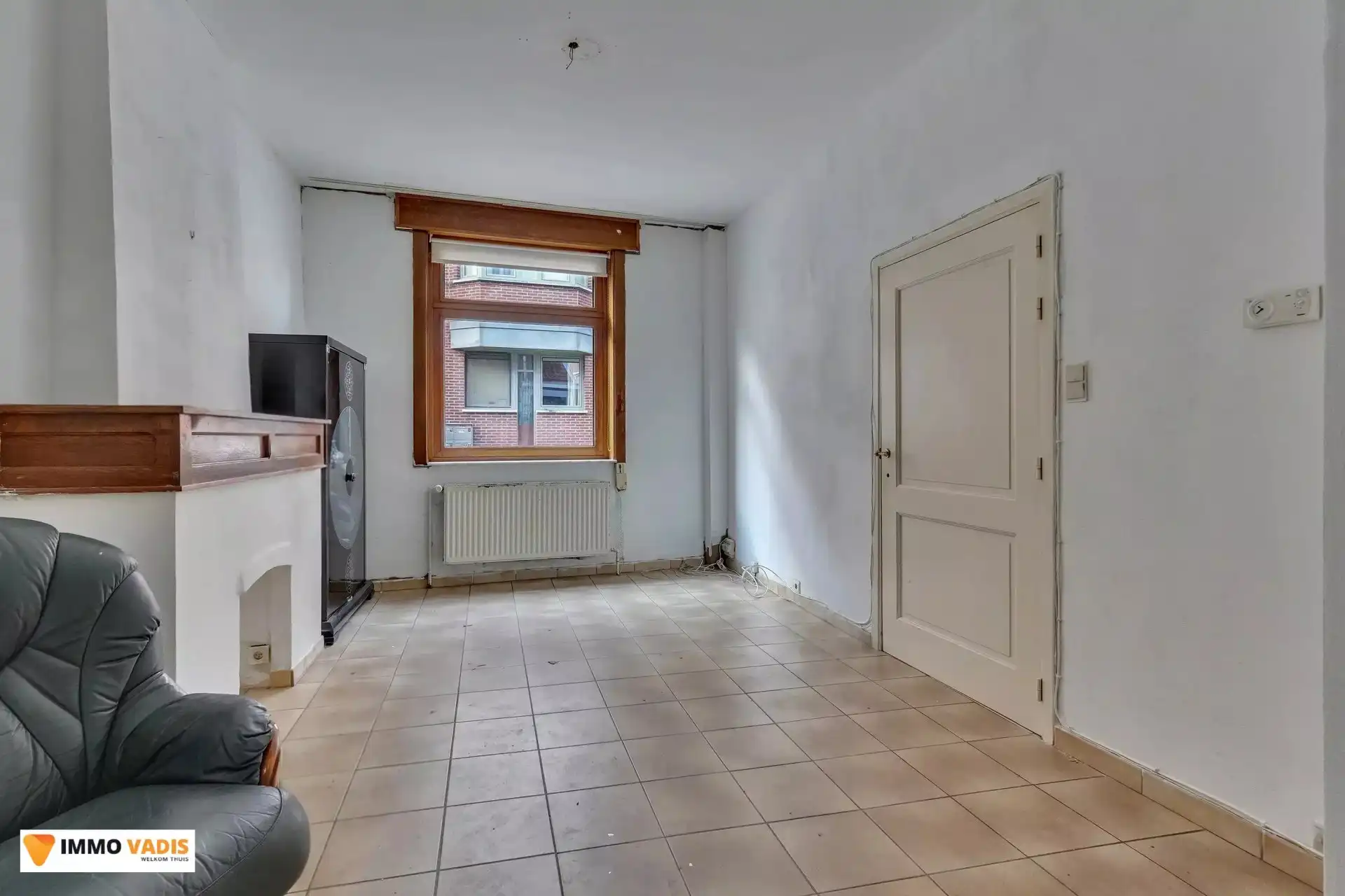 Authentiek herenhuis met karakter, klaar voor een stijlvolle renovatie. foto 3