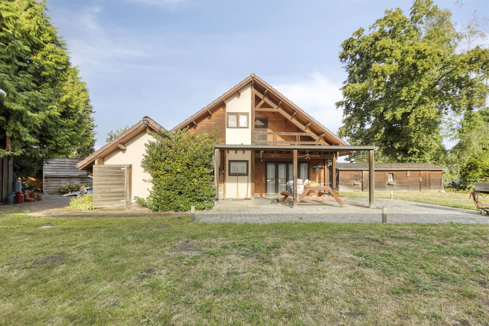 Hoofdfoto van de publicatie: TE KOOP: Woning met magazijn te Heusden-Zolder! 