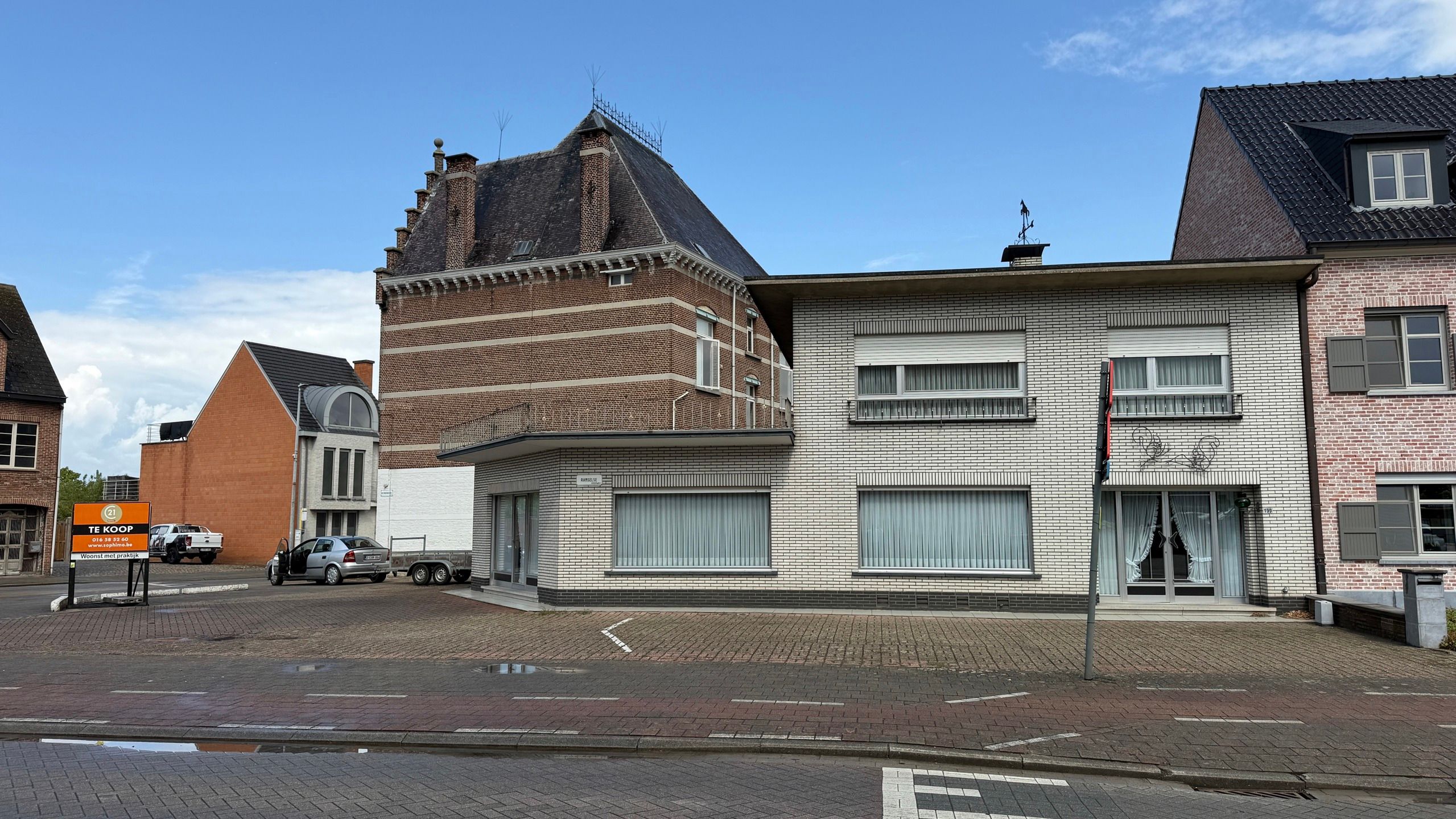 Goedgelegen woning met handelsruimte foto 16