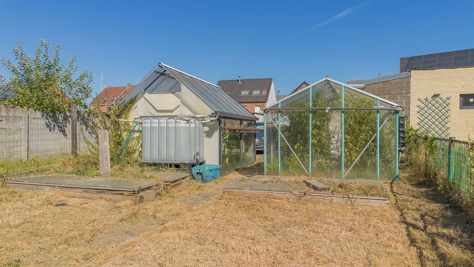 Gezellige HOB met ruime tuin, serres, tuinhuis en eigen oprit te Buggenhout foto 23