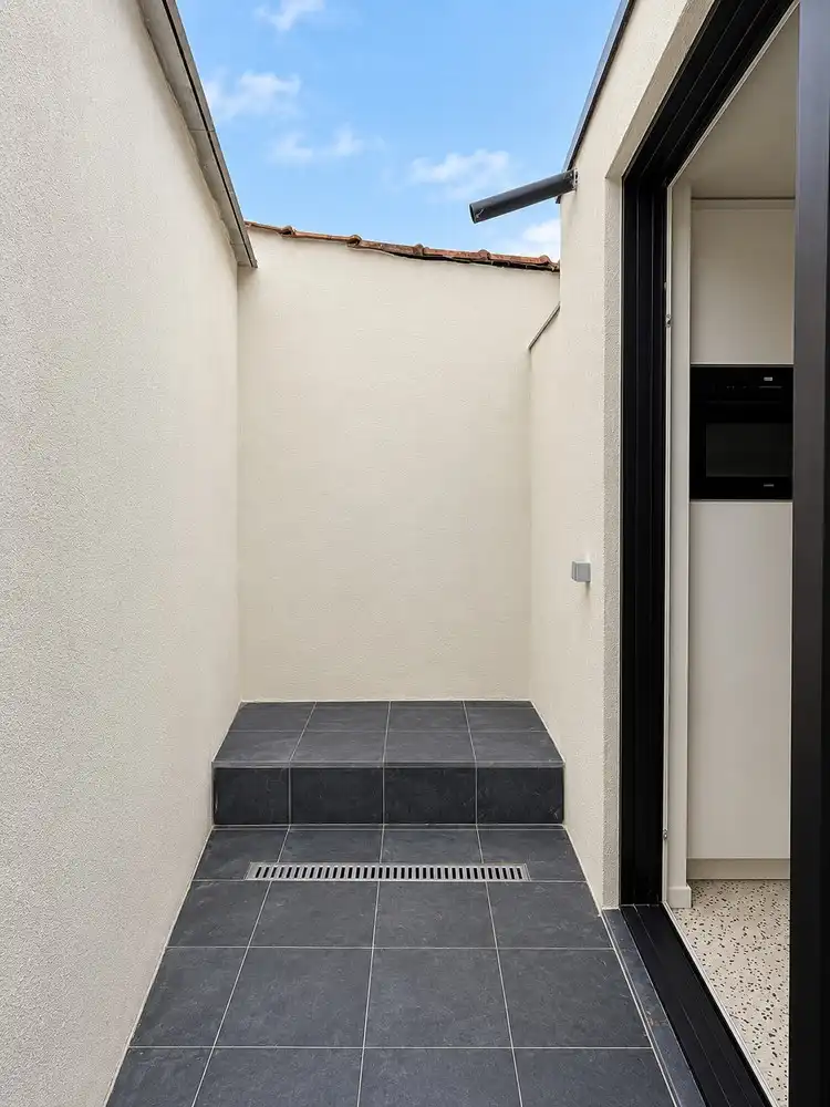 Vernieuwbouwwoning met 3 slaapkamers en koer foto 6