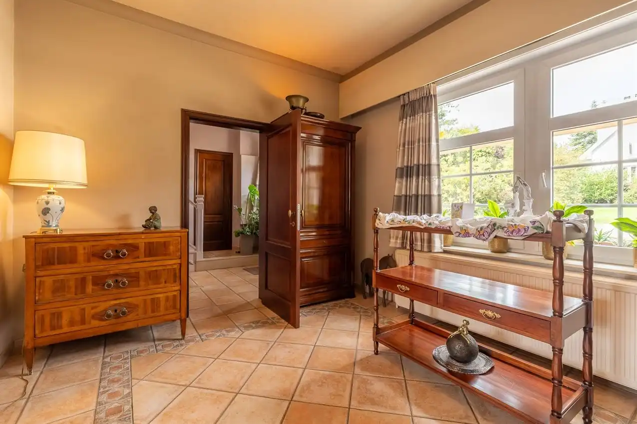 Karaktervolle en instapklare woning met zonnige tuin nabij het Gras- en Crauwelsbos foto 15