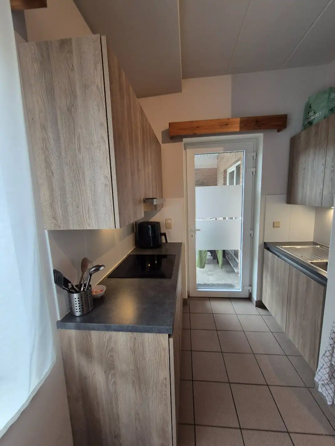 Gelijkvloers appartement met terras en autostandplaats foto 4