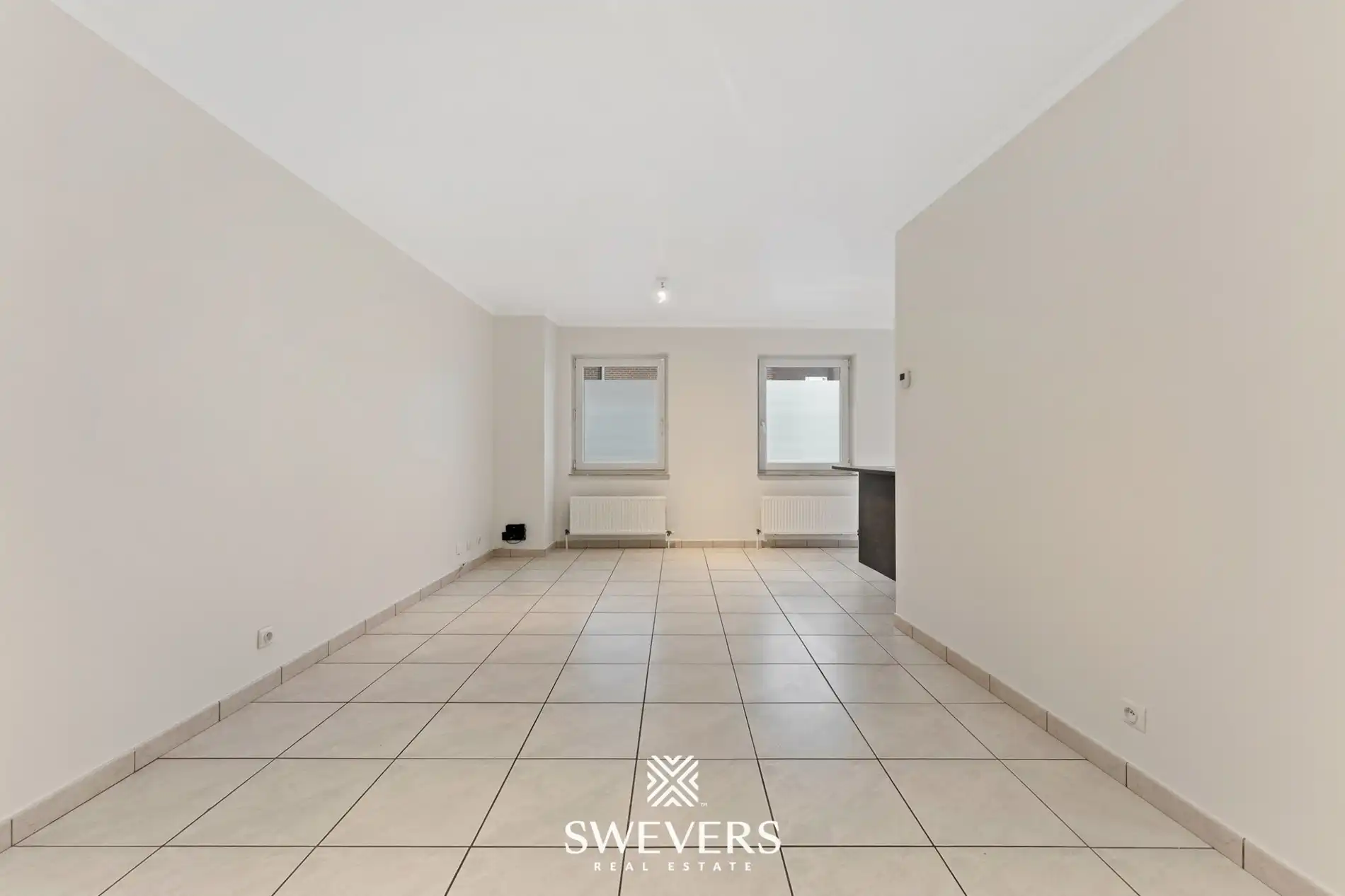 Ontdek dit instapklaar, energiezuinig en verrassend ruim gelijkvloers appartement in het charmante Zichem foto 3