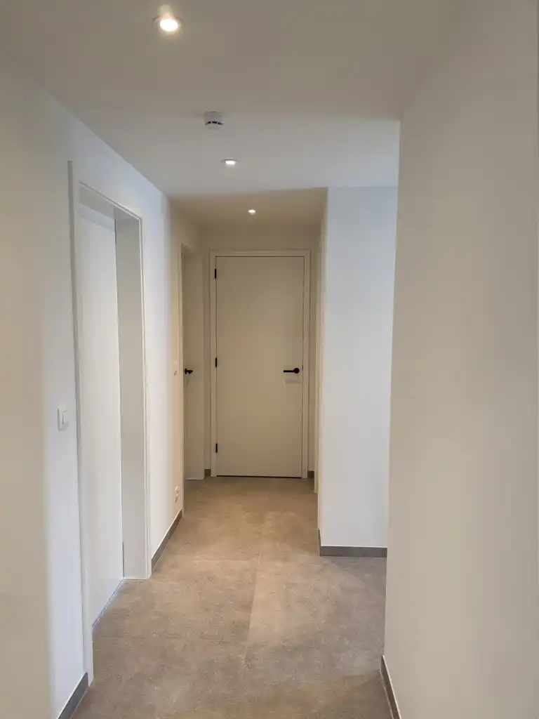 Nieuwbouw app. met 2 slpks, terras, tuin en 2 staanplaatsen foto 6