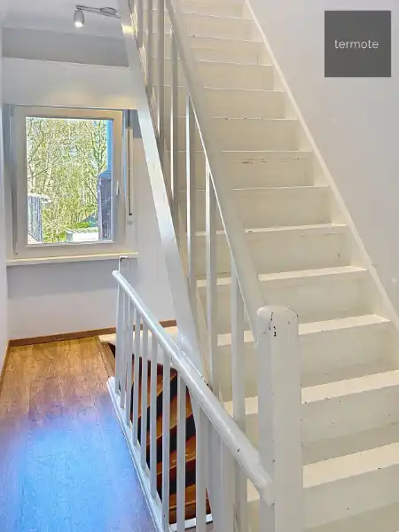 Knusse rijwoning foto 13