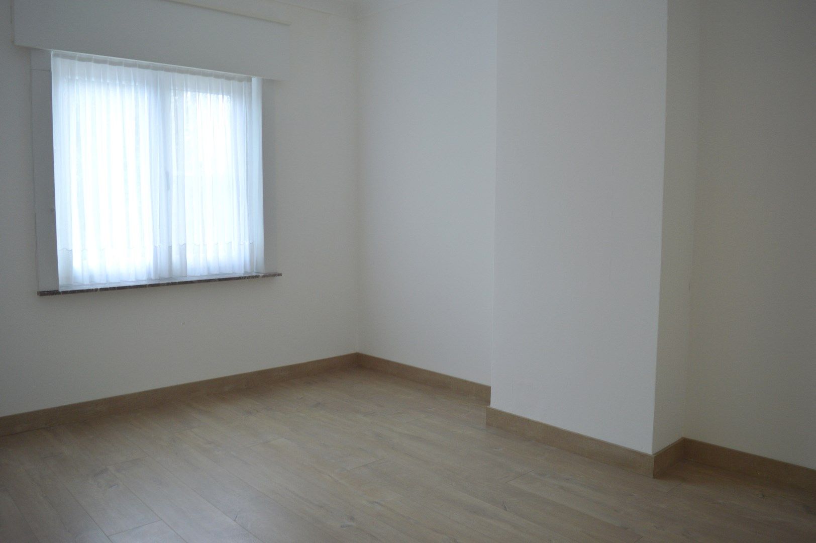 Ruime gezinswoning met 3 slaapkamers in Kuurne met vlotte bereikbaarheid foto 8