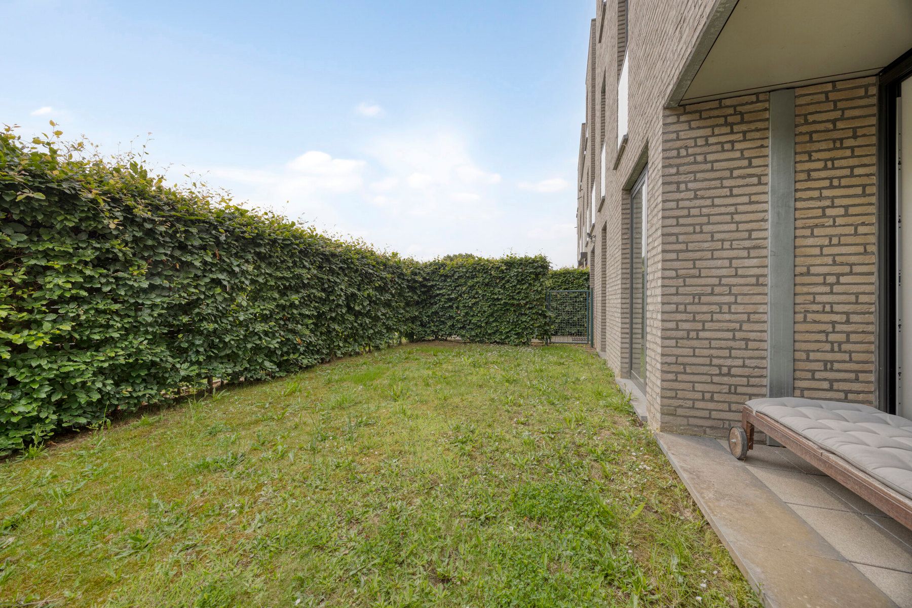 Ruim gelijkvloersappartement met tuin en garage foto 22