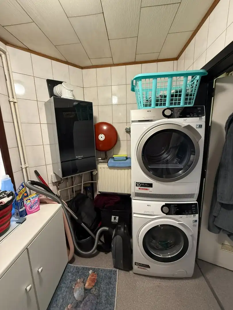 Opbrengsteigendom bestaande uit 2 halfopen woningen met garage en tuin te Hechtel. foto 29