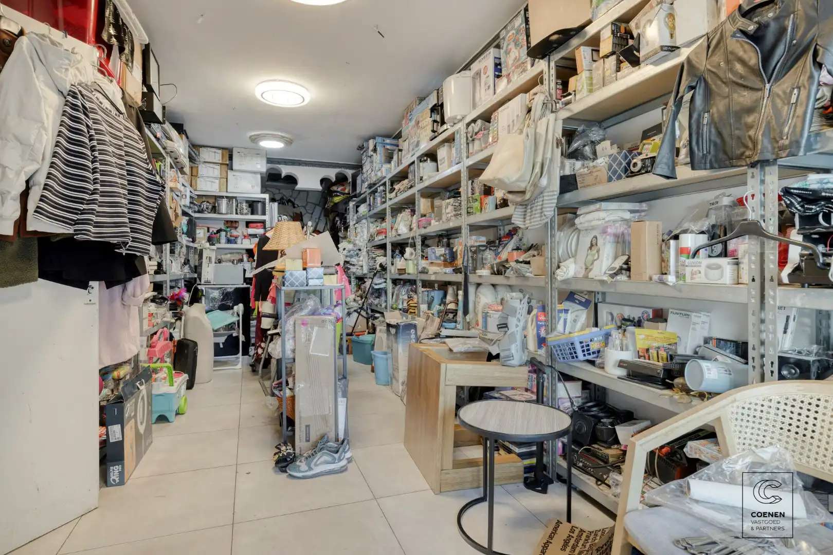 Ruime handelswoning, momenteel ingericht als handelsruimte en 2 appartementen op goede ligging te Antwerpen! foto 28