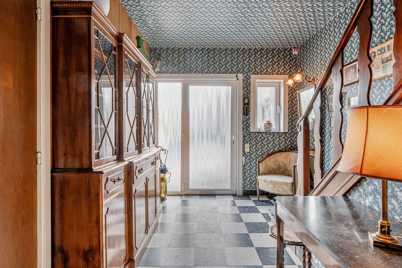 Gezellige, te renoveren, woning met charmante tuin aan een groenzone foto 8