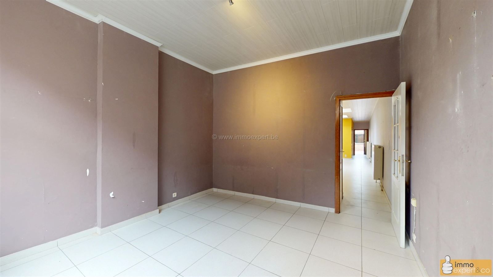 NINOVE: Centraal gelegen woning met 2 slpks, garage en koer foto 2