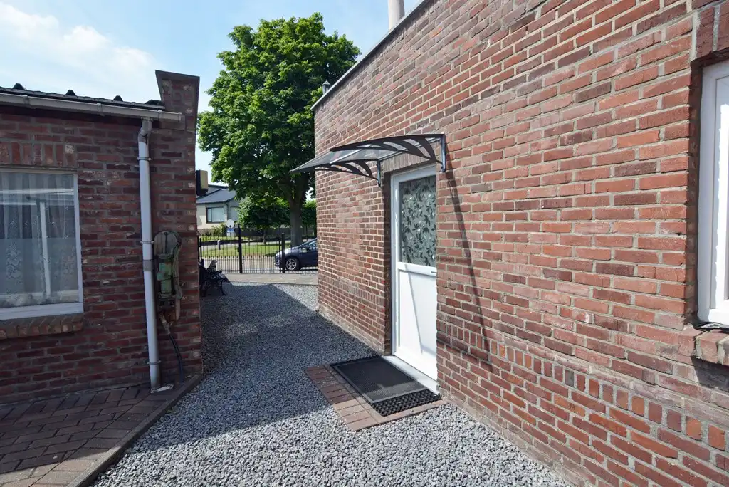 Gelijkvloers appartement met 3 slpks, veranda, tuin en garage foto 23