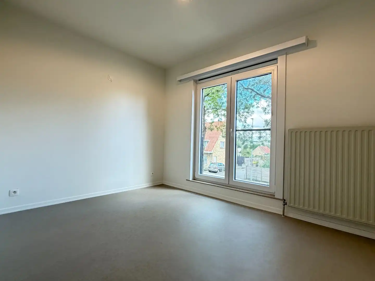 Lichtrijk 3-slaapkamerappartement met garage foto 11