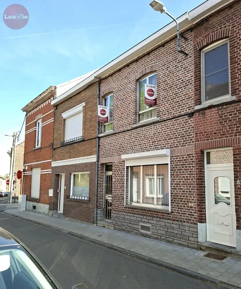 Goed gelegen woning // 2 slaapkamers + zolder om af te werken foto 37