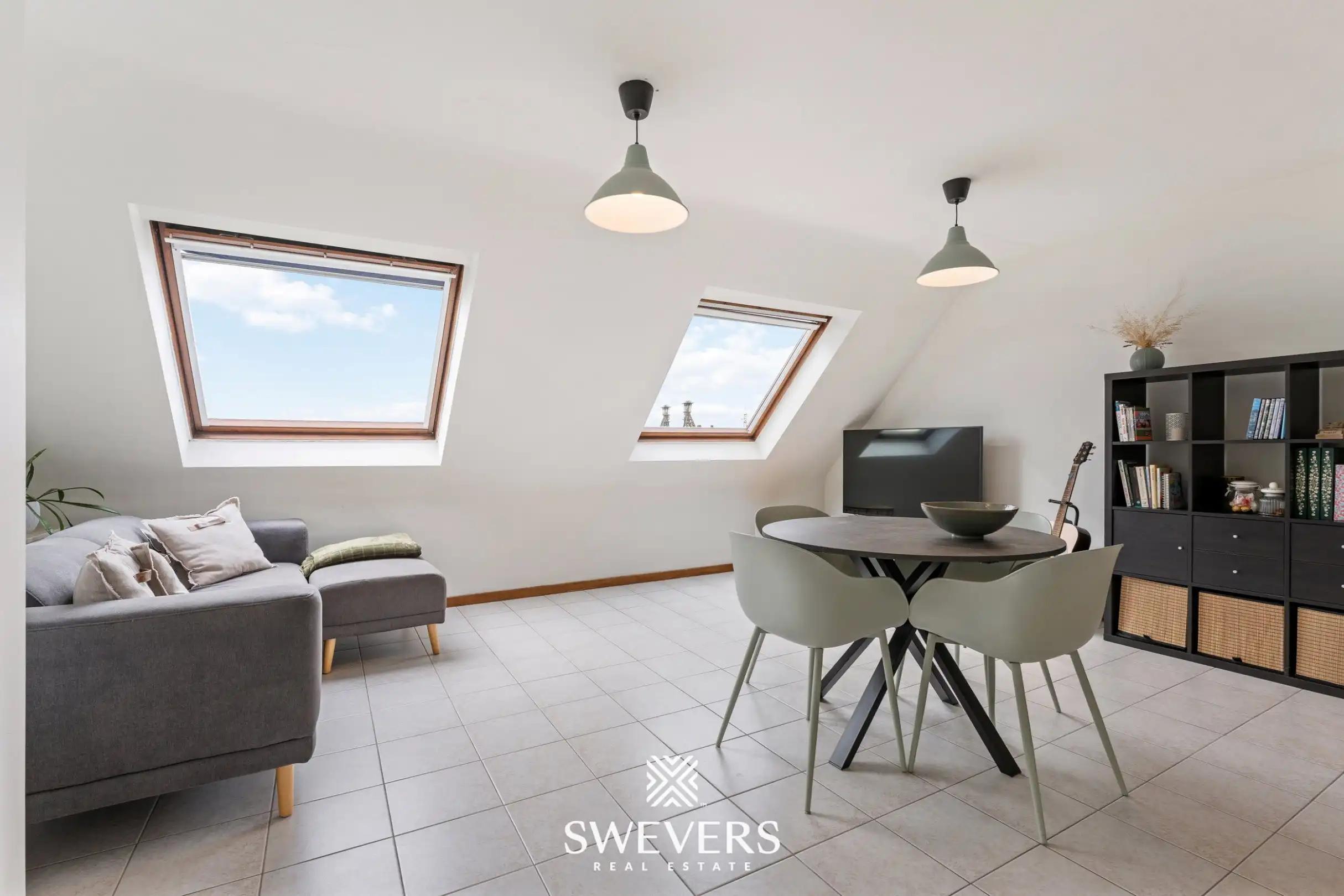 Instapklaar en lichtrijk 1-slaapkamerappartement op topligging in Houthalen centrum foto 3